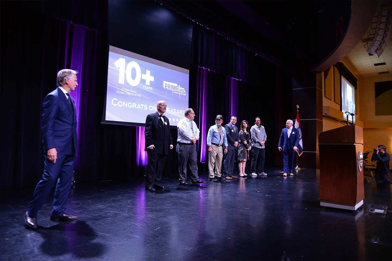 Truck drivers who've driven for Prime Inc. for 10-14 years being honored on-stage at the 10-year dinner.