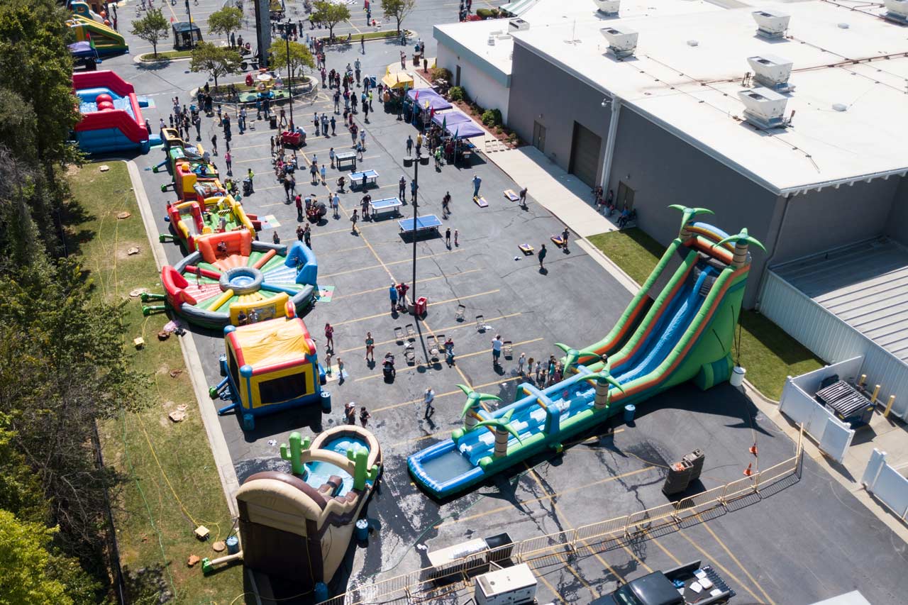 Inflatables and carnivals games set up for the Prime Company picnic.