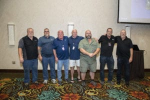 A group of driving instructors posing for a picture at Prime's annual CDL Instructor Awards.