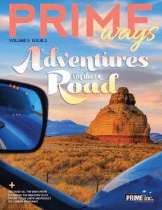 The cover of Prime Ways magazine with the words "Adventures on the Road" written on the front.