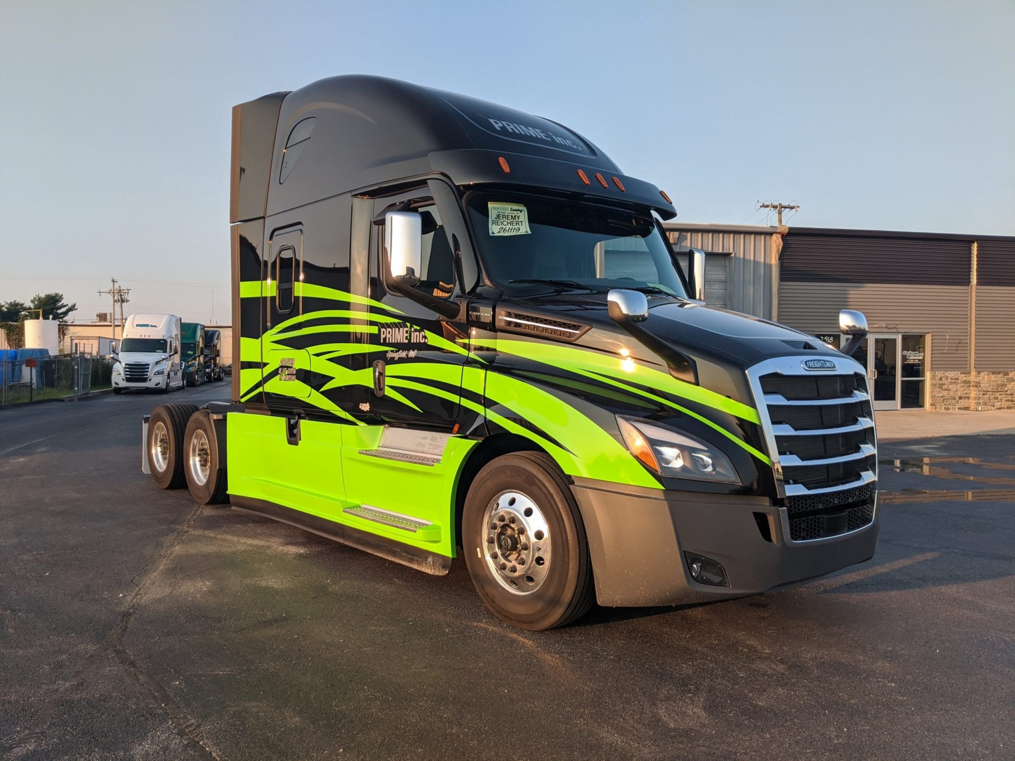 Truck with custom green stripe work.