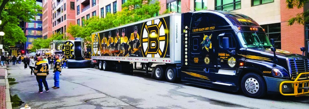 Team Spirit: Customized Truck Wraps - Prime, Inc.